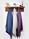 THREE CASHMERE BLANKETS HANGING 